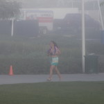 Cathy runs barefoot in the Aloha 5K on a foggy morning in Long Beach California