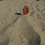Adreah buried on the beach