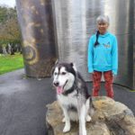 Kay (Siberian Husky) Poses in Front of Stainless Steel Sculpture
